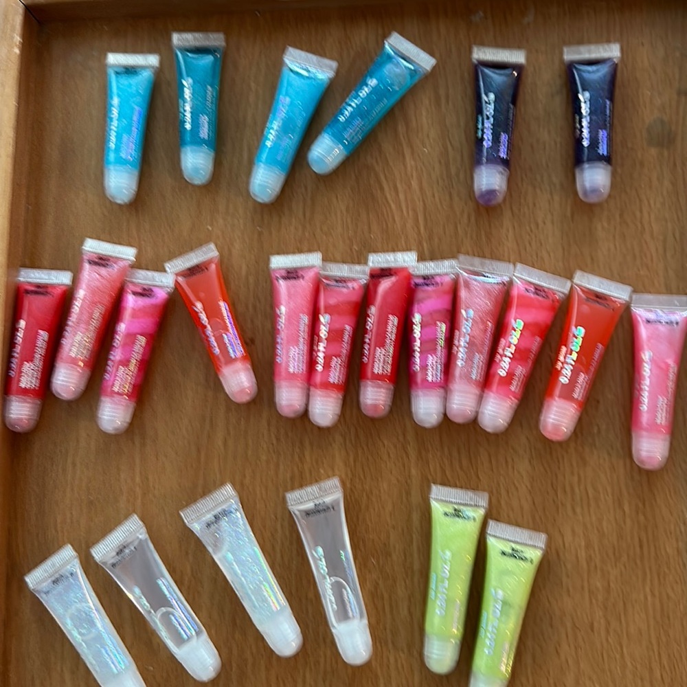 New unopened lip glosses from justice all different colors/flavors.